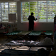 Many Puerto Ricans, like this teenage boy in a school-turned-shelter, were left homeless by Hurricane Maria. Photo: AP